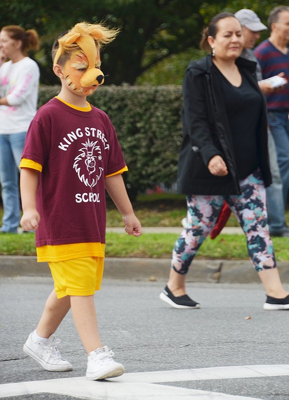 Full of King Street School pride, second grader Dominick Becerra dons a lion nose, ears and matching face paint. 