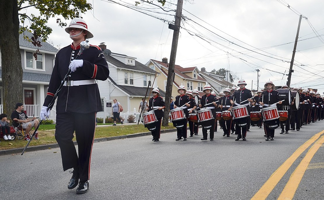 Port Chester High School Parade Drum Major Brendan Johnston leads the Pride of Port Chester down Westchester Avenue. 