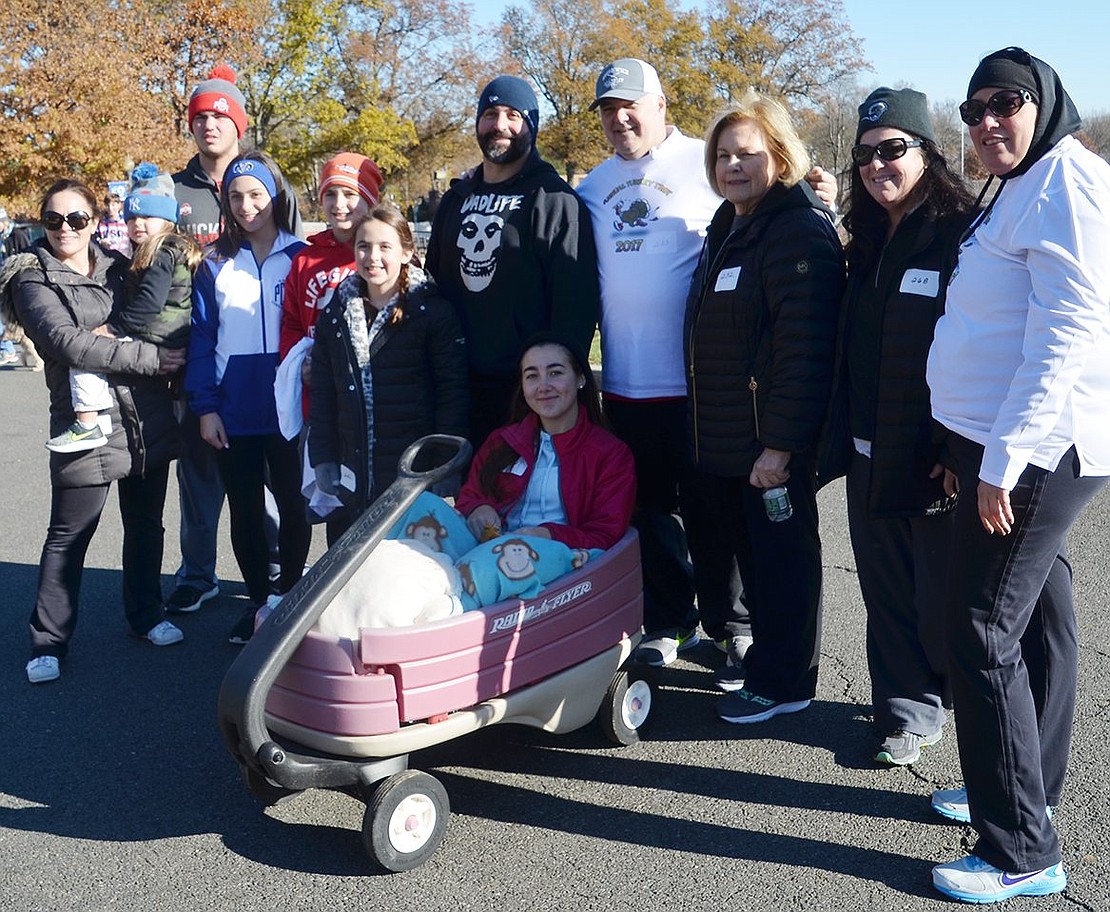 The Lovallo family won the prize for having the most participants at 14. A few had scattered before the photo.