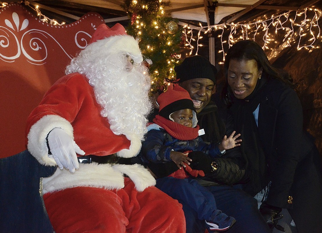 The Branch family is excited to meet Santa! Neuton Avenue residents Alecia and Kevin join their 20-month-old son, Ethan, inside Santa’s booth. Santa’s secret identity is Rocco Furano, who works for the Rye Brook Recreation Department.