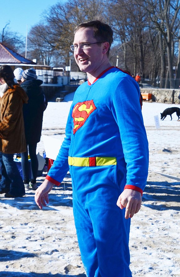 Superman, also known as Rye resident Jeremy Dorin, studies his next obstacle of jumping into Long Island Sound.