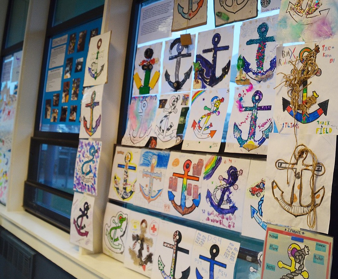 Colorful anchor masterpieces stretch across the wall in the lobby. 