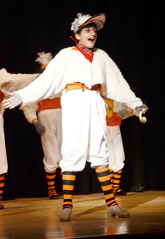 Scuttle, played by Corey Schiz, squawks during a tap routine with a flock of seagulls about his knowledge of human objects. 