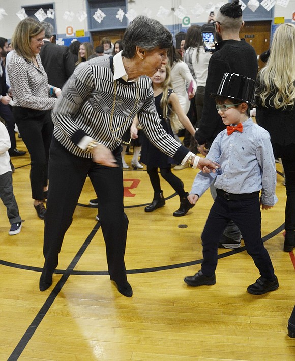 Sammy Samuels has fun with Grandma on the dance floor