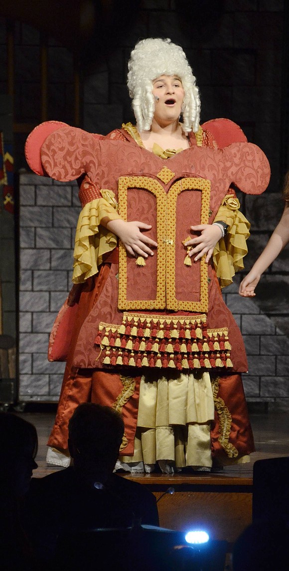 Madame De La Grande Bouche the wardrobe, played by Alexa Tomassetti, belts some operatic vocals.  