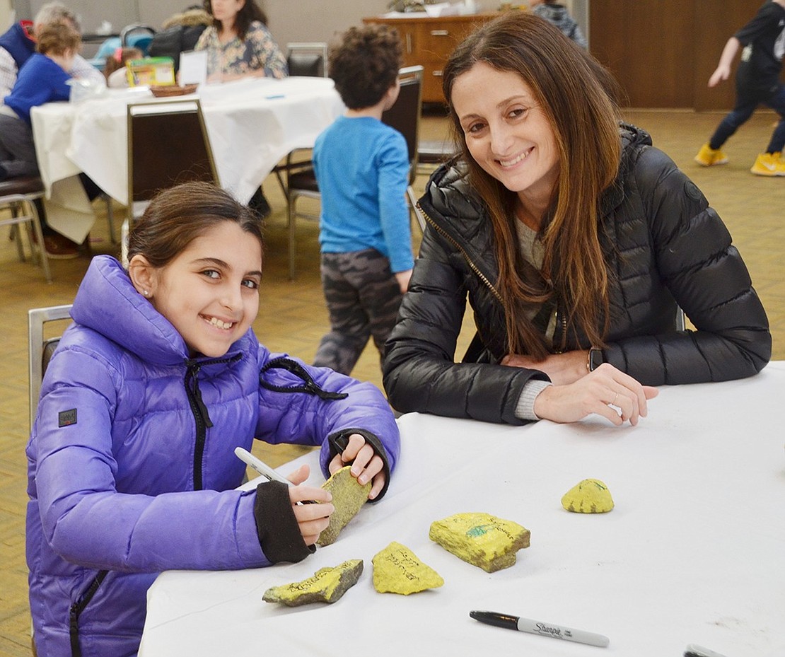 Jordana Esterow, 10, and her mother Lindsay, Rye Brook residents, share some mommy-daughter bonding time as they make kindness rocks together. 