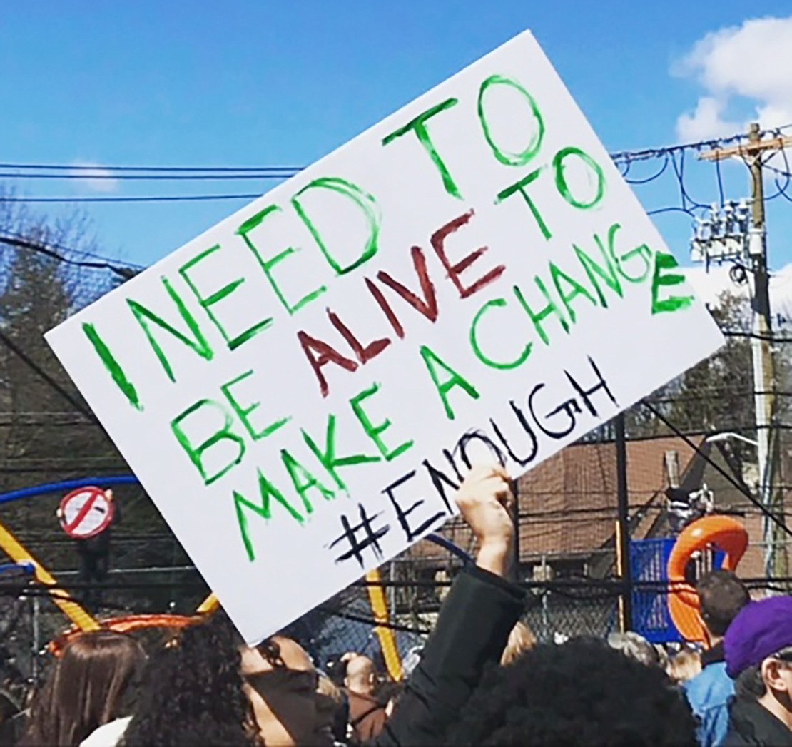 Emotional signs stressing the severity of gun violence are held high at the March for Our Lives rally in White Plains.  Courtesy of Gina Tarascio 