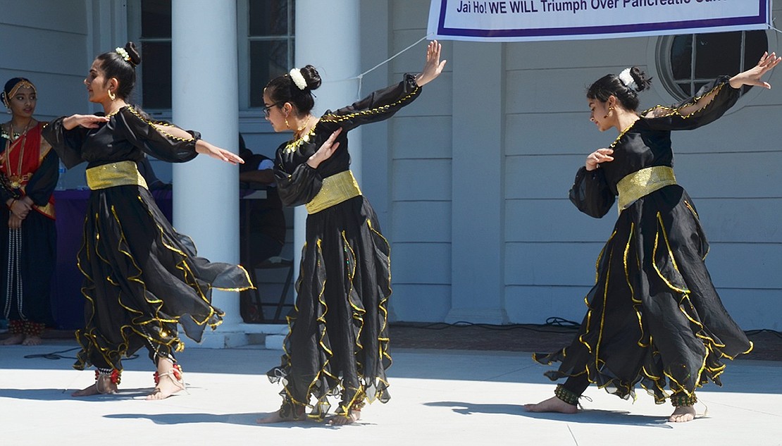 New Canaan, Conn. resident Riya Punjabi, 13, (left), Anika Tandon, 14, and Rhea Wadhwa, 14, gracefully showcase their choreographed dance. Tandon and Wadhwa live in Stamford, Conn.   