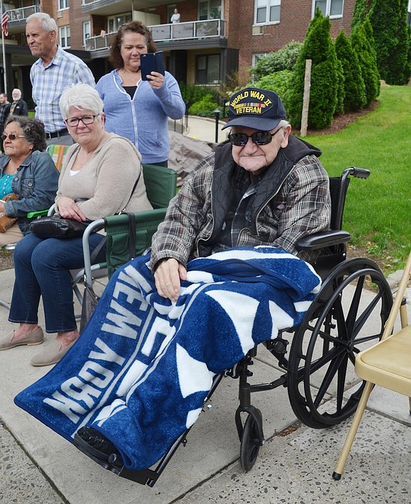 Ninety-two-year-old World War II veteran Domenic Rutigliano of 370 Westchester Ave. was popular among the elected officials marching in the parade who stopped to shake his hand.