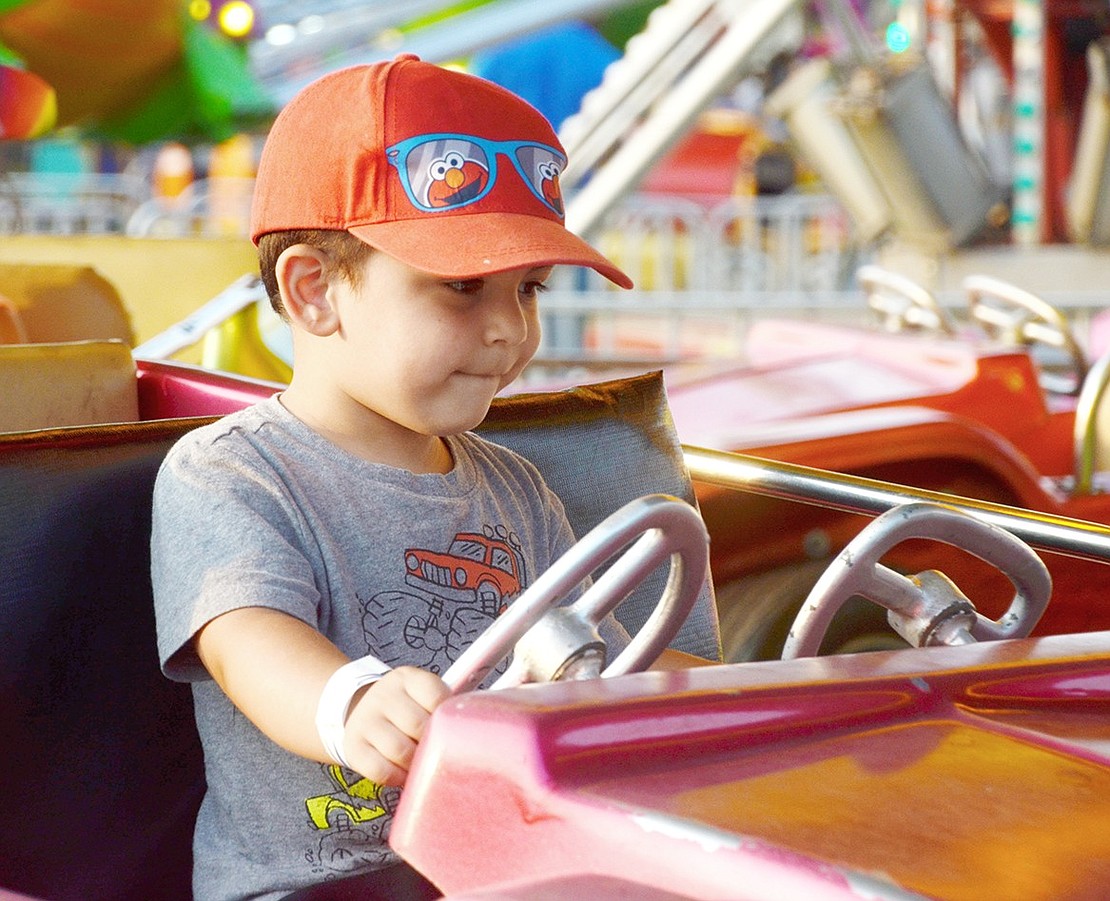 He may be 2 years old and the car may be on a track, but Harrison resident Anthony Carducci is showing the world he’s ready to hit the road. 