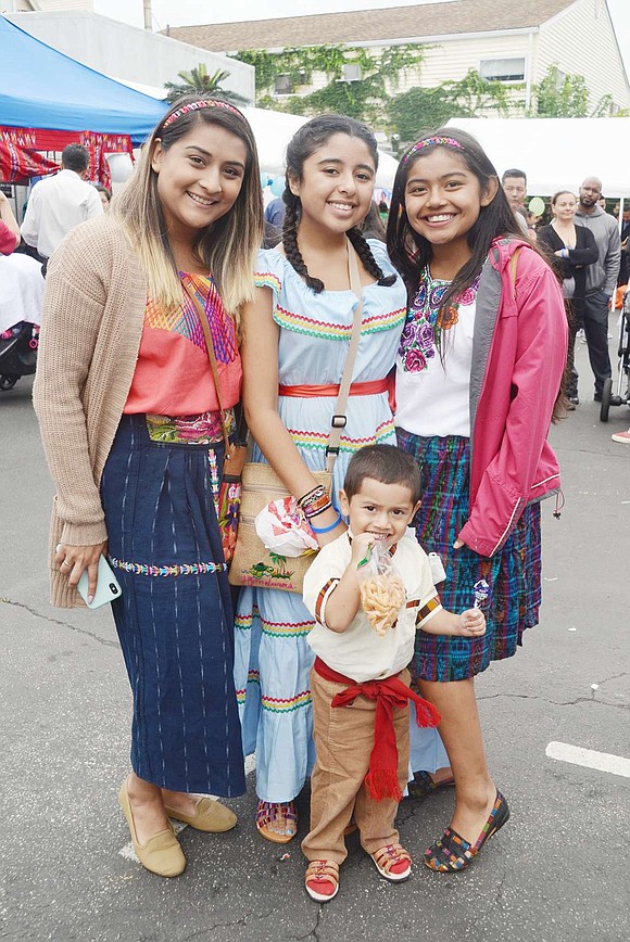 Of the 150-plus festival attendees, many celebrate cultural pride by wearing traditional and typical clothing of their heritage. Greenwich, Conn. resident Ashley Sierra (middle) sports a gorgeous blue Mexican dress, while Elm Street resident Jocelyn Marroquin (left) fashions Guatemalan attire with her Port Chester High School sophomore relative Genesis and 3-year-old son Lucas Escobar.