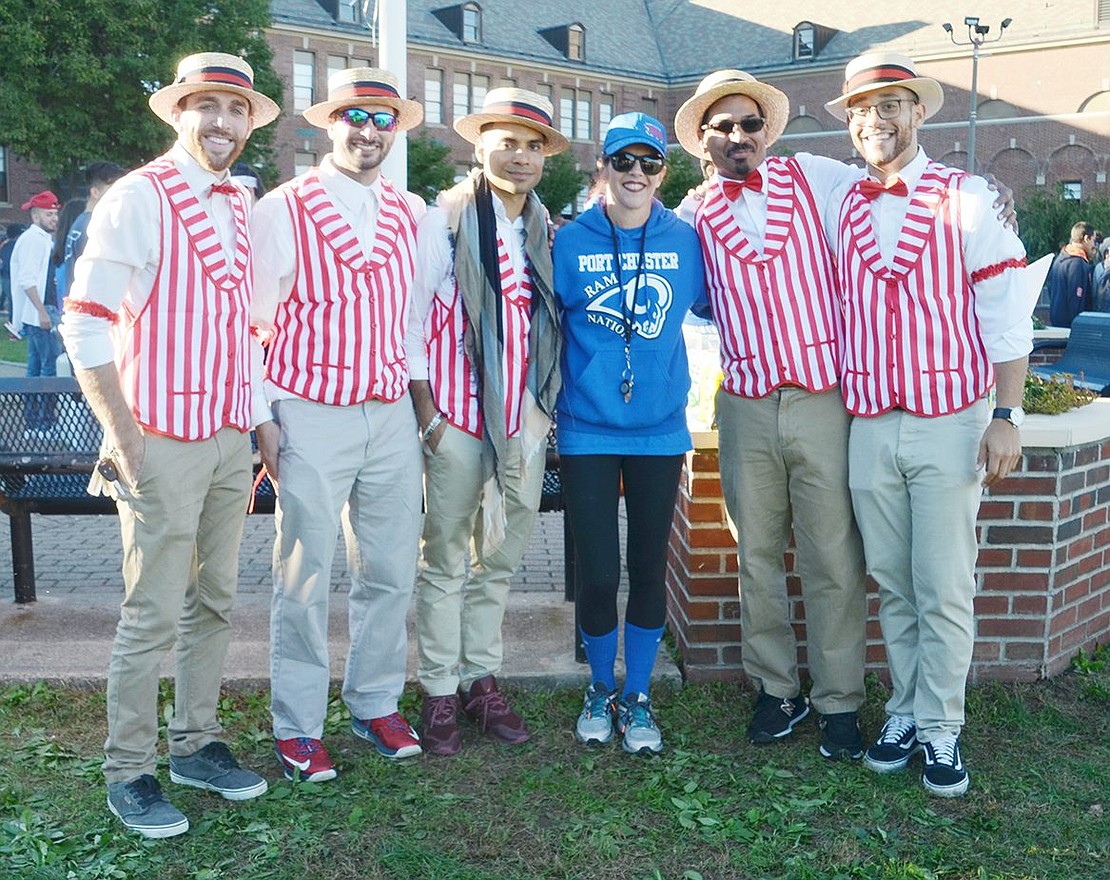 To support an event that raised $5,500 to split between the American Red Cross and the student body, teachers and event organizers wear costumes to create a true carnival atmosphere. From the left: Eric DiNome, Michael Stabile, Rigoberto Martinez, Jacqueline Bisignano, Porfirio Gonzowitz and Jeffrey Kravitz.