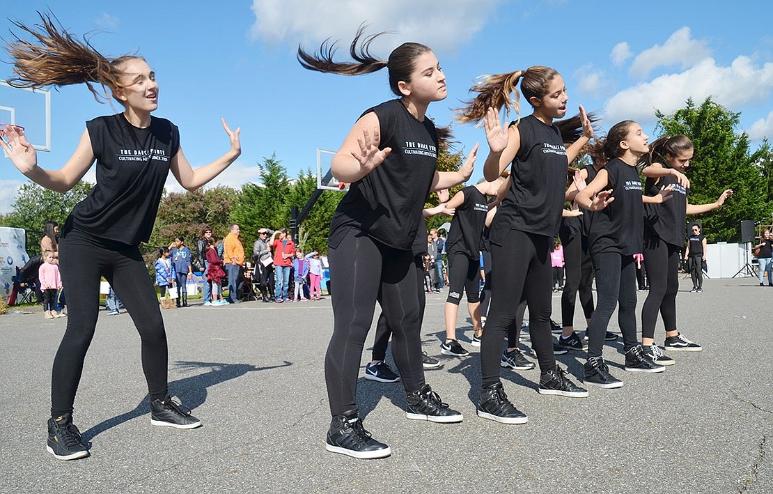 A student squad from The Dance Pointe, a Greenwich, Conn.-based dance studio, takes over the basketball court for a bold hip-hop performance.