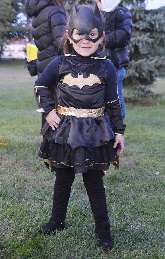 Never fear, Batman is here–or at least North Regent Street 4-year-old Sophia Carajal is doing a super job taking on the role.