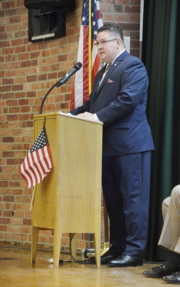 One of several speakers at King Street School, William Villanova specifically urges the room to remember and honor the female veterans who serve the U.S. “We must never forget the women veterans and how they shaped our future,” he said, before reciting the poem “Invisible Soldier” by Sarge Lintecum.