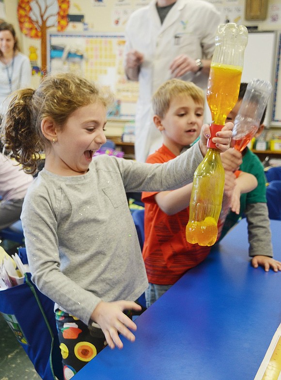 Her face says it all as Hannah Hochfelder squeals with joy upon successfully creating a bright orange tornado. The kindergartener learned different scientific principles about weather when a scientist from High Touch High Tech, a children’s science program company, visited Ridge Street Elementary School kindergarten classes on Tuesday, Dec. 4.