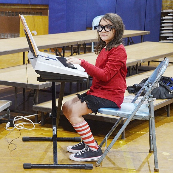 Marcie, played by Milena Martinez, breaks the fourth wall and kicks Musical Director Cindy Moore off the piano for a few minutes to show Schroeder’s not the only one who can play Beethoven.