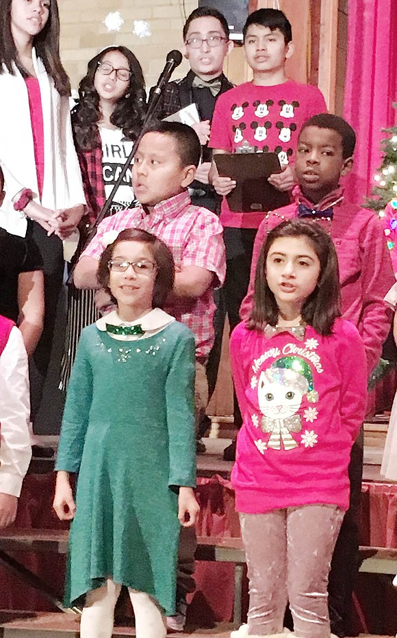 As “An Unplugged Christmas” featured students from third- to eighth-grade at Corpus Christi-Holy Rosary School, a group of mixed-aged kids sing holiday tunes during the performance. Top left: Gabriella Silva, Anahi Cabrera, Matthew Campoverde and Francisco Garcia. Middle left: Jacob Paltin and John Turner. Bottom left: Micaela Candelaria and Juliette Ianni. Courtesy of Kathy Zaccagnino 