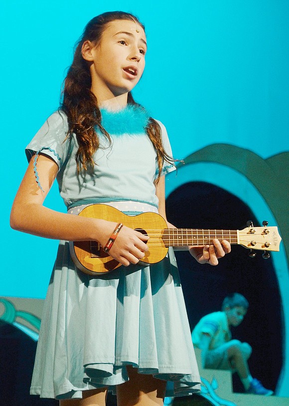 With a ukulele in hand, Gertrude McFuzz, played by Cassidy Wohl, reveals her affections for Horton the Elephant during “One Feather Tail of Gertrude McFuzz.”