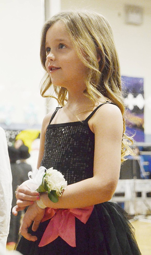 Layla Brown lovingly sings “I Am Your Child” to her parents with the rest of the first-grade classes.