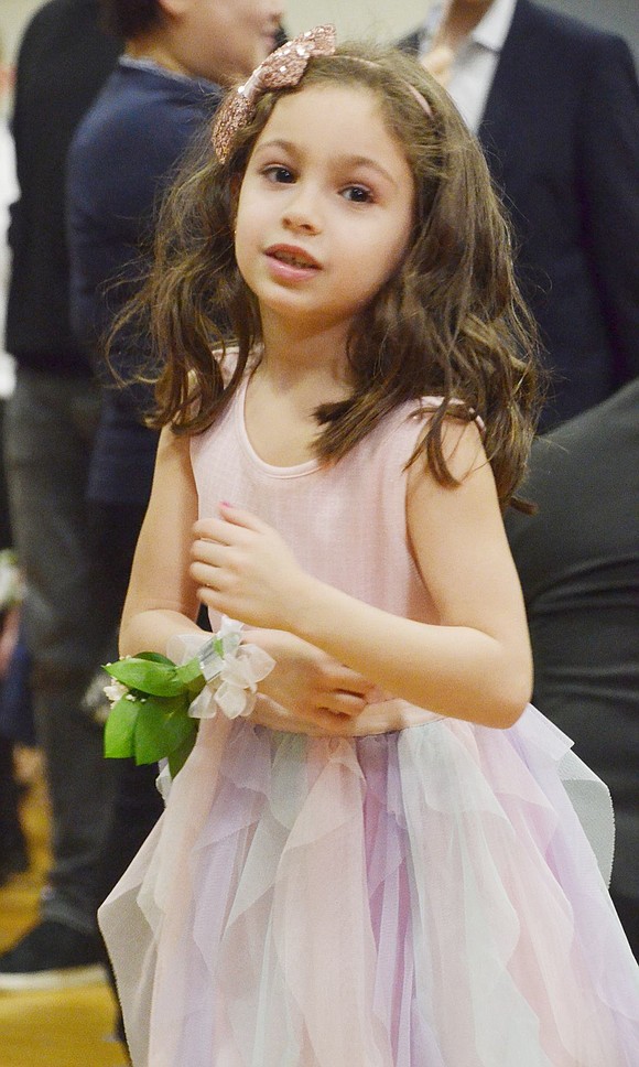 Looking chic in her pastel multicolor tutu, Nino Rizzo gracefully cha-chas during the “Cha-Cha Slide.”