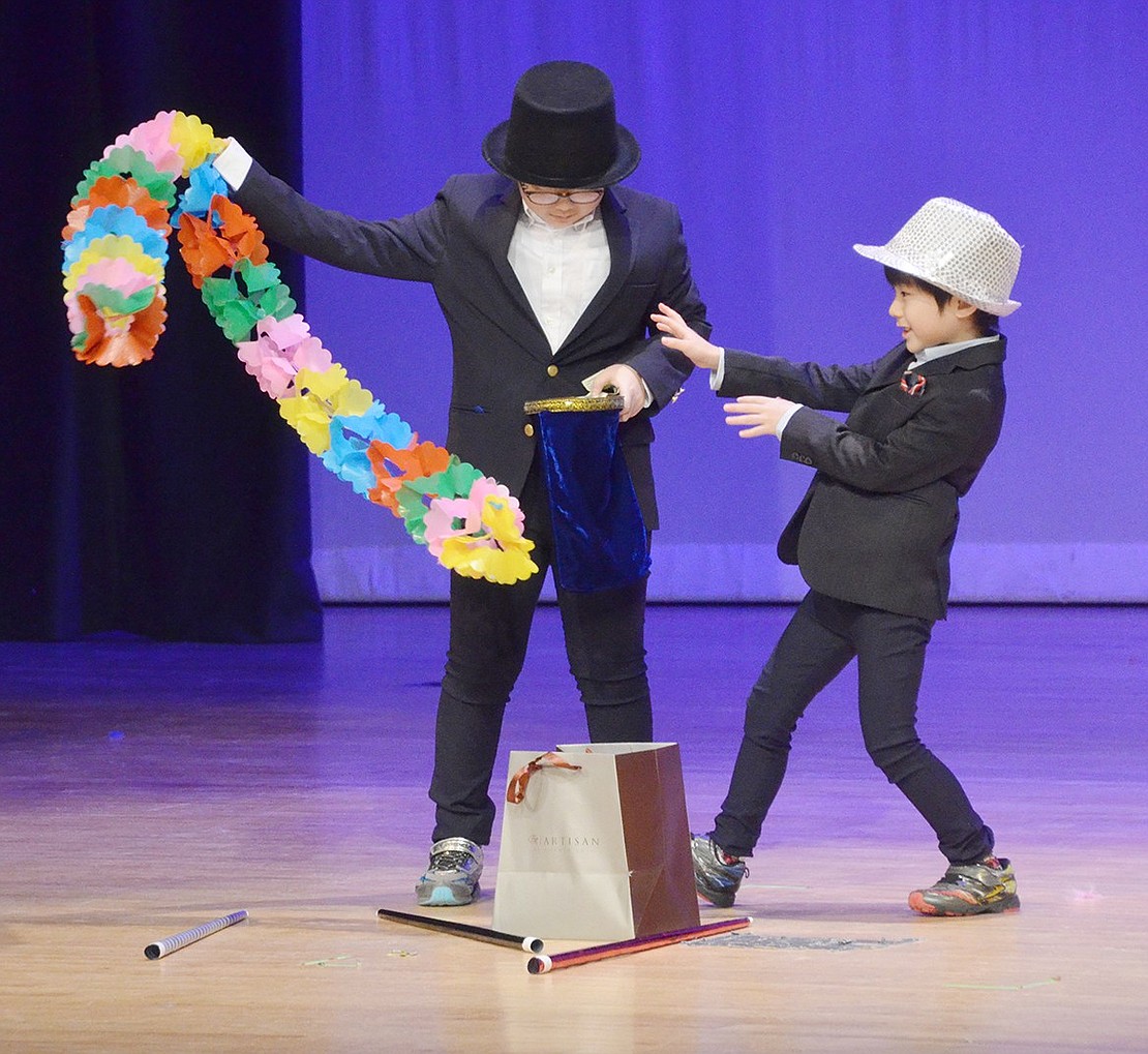 The amazing Super Magic Brothers brought enchantment to the stage during the “Blind Brook’s Got Talent” Destination Imagination fundraiser on Friday, Feb. 1. As fourth-grader Atsuhiro Wada pulls a boundless stream of color from a small bag, first-grader Hiroyoshi Wada adds pizazz with jazz hands.