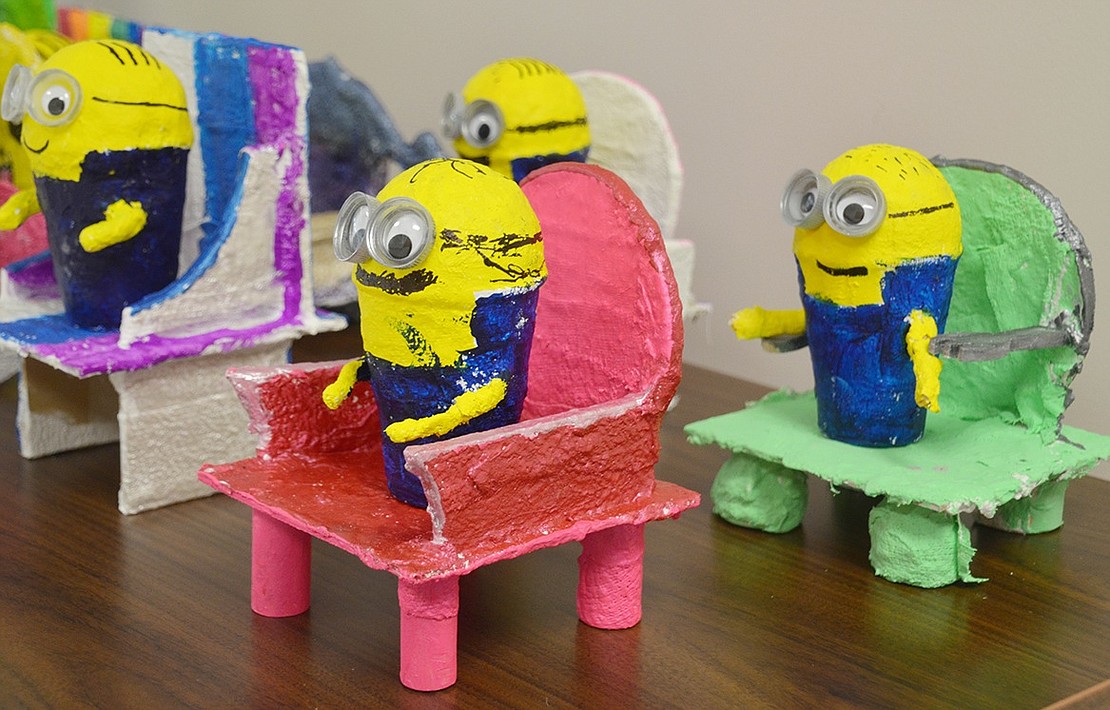 An exhibit room in the Blind Brook Middle School wing displays several creations from Ridge Street School STEAM and art classes. These fourth-grade Minion Chairs projects combined the two by having students artistically design and construct stable seats for the cartoon figures.