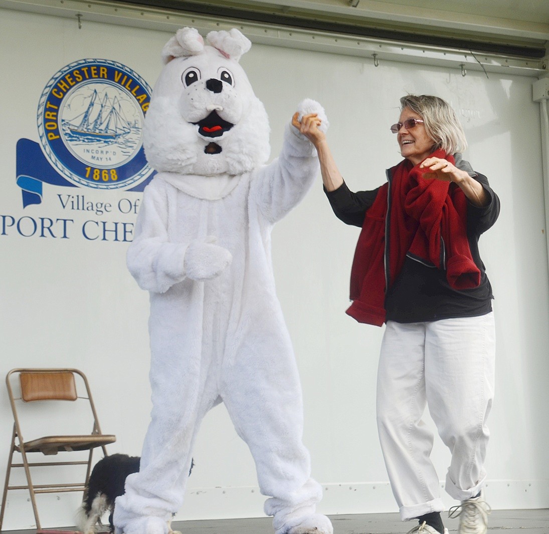 With no kids in line for a greeting, Carolyn Mann waltzes with the Easter Bunny to romantic Disney tunes during Easter in the Park at Lyon Park on Saturday Apr. 13. “It’s always good to have a bunny who can dance,” the Puritan Drive resident said. For more photos, turn to page 15. Sarah Wolpoff|Westmore News 