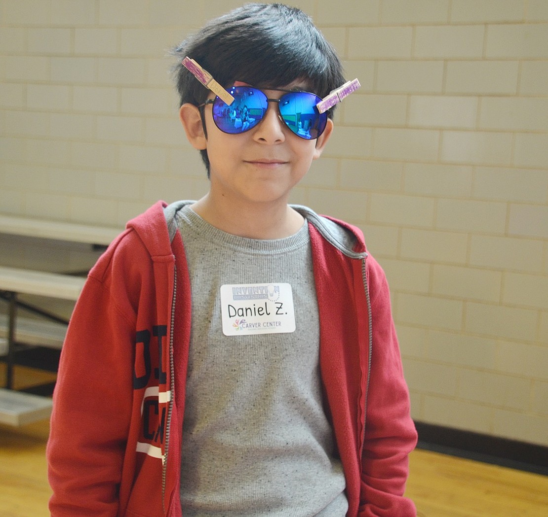 Daniel Zavala looks very cool in the shades he tweaked by fastening colorful plastic filters to the inside. “It can help people with colorblindness or can just help you see the world in a different way,” the John F. Kennedy School fifth-grader said.