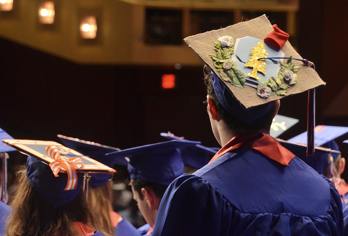 Inspired by the coat of arms of Argentina seal, Agustin Otero spent several hours crafting his graduation cap.