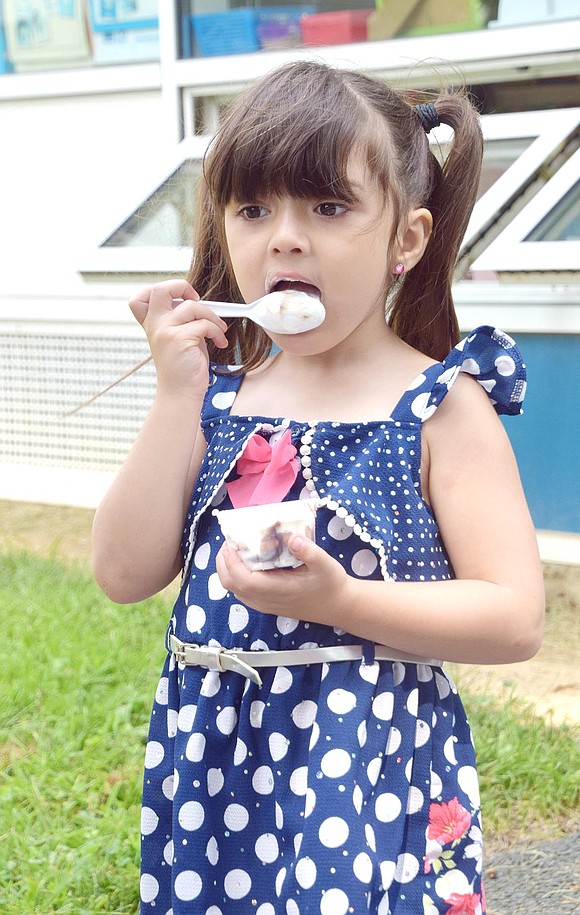 While her mother and new teacher get to know each other at the King Street Elementary School kindergarten Ice Cream Social on Wednesday, Sept. 4, Grandview Avenue resident Mia Discepolo is way too preoccupied with her chocolate and vanilla ice cream to chat.