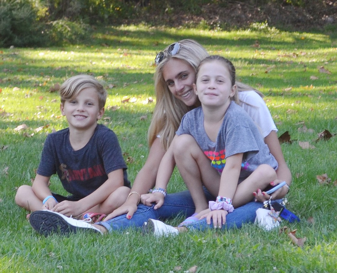 Twins Sebastian and Hayden Candee, both rising third-graders at Ridge Street School, said they had fun at the 8th annual Blind Brook Federation of Teachers-sponsored Meet and Greet on Tuesday, Sept. 3 in Harkness Park. Before taking a seat in the grass with their babysitter Chiara Michos, a Blind Brook High School senior, they had the opportunity to get to know their new teachers. 