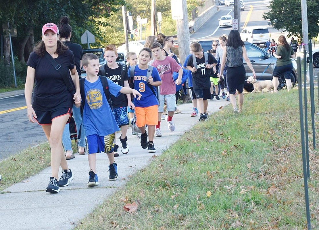 For the 11th year in a row, parents, students, dogs of all shapes and sizes, bikers, scooterers and walkers made their way to Ridge Street School.