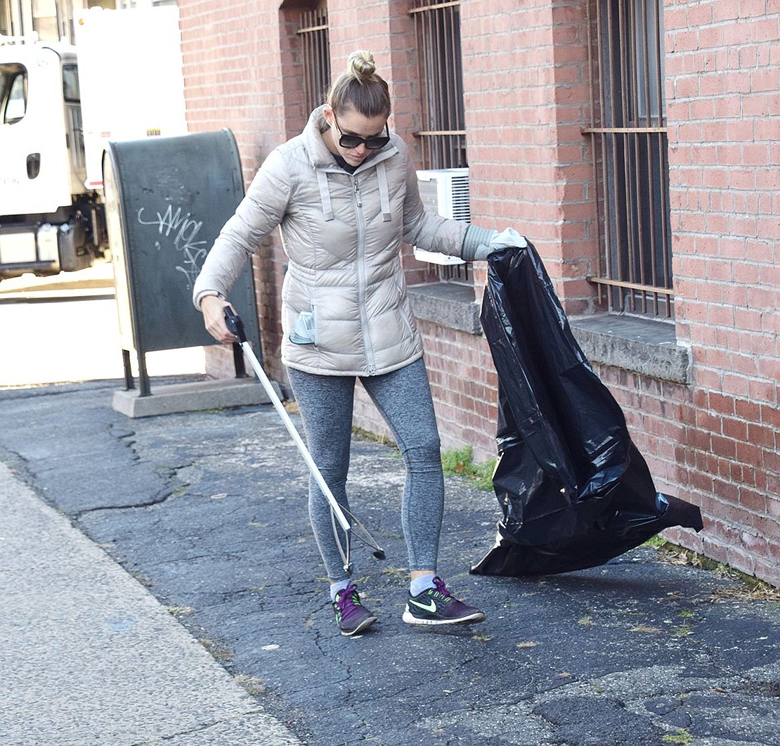 Cigarette butts were a common item that volunteers like North Regent Street resident Amanda Barrow collected from the Irving Avenue and Poningo Street sidewalks.