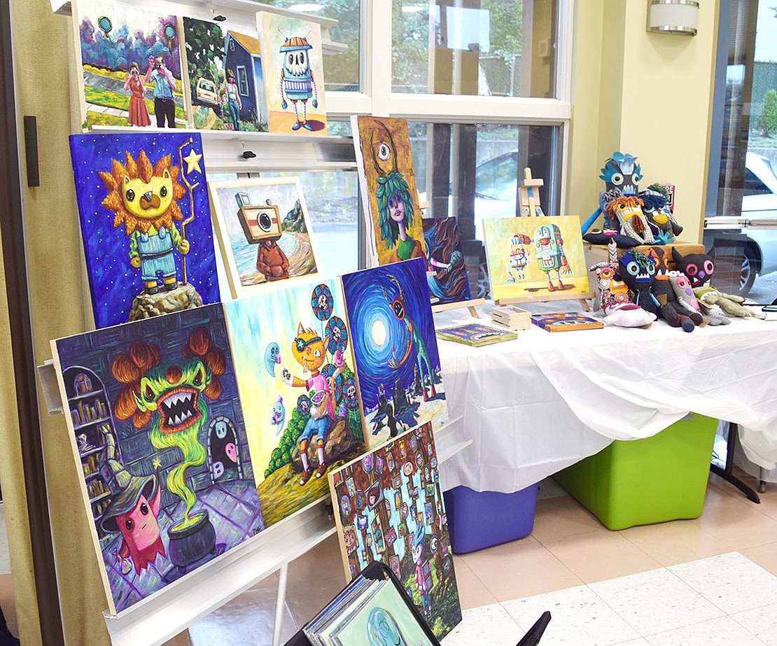 Whimsical and spooky canvases and sock creatures created by Port Chester resident Paul Rively embellish the back corner of the Posillipo Community Center.