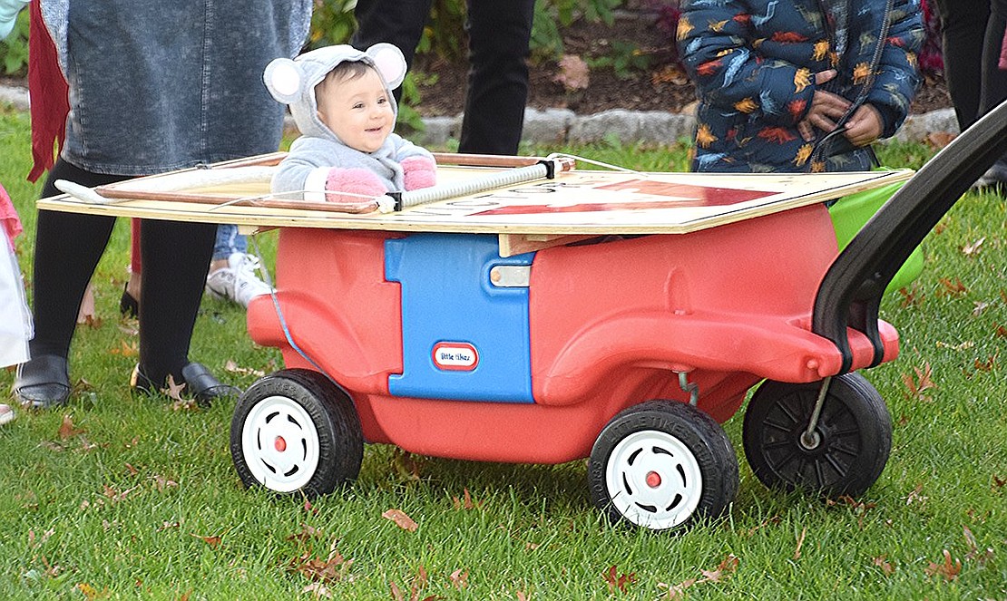 Daringly darling, 7-month-old Browndale Place resident Maya Saffer prepares to be wheeled up to the stage and dazzle the judges with her mouse in a trap costume—which ultimately won a cutest costume award.