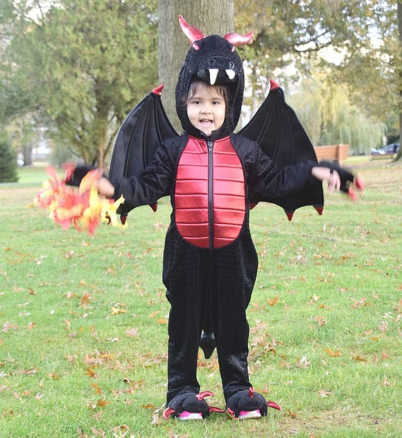 Look out for Maya Guzman as she waves her arms to fly around Lyon Park! The 3-year-old Glen Avenue resident may be the cutest dragon around town.