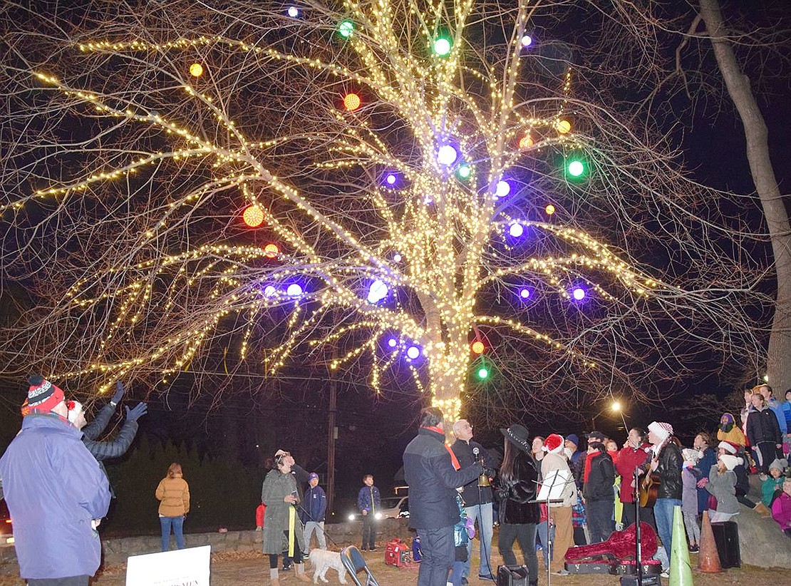 More than 300 people gather on Saturday, Dec. 7, to watch the second annual Christmas tree lighting at the corner of Forest and Rye Beach avenues in Rye Town Park. Onlookers had the opportunity to meet Santa Claus and enjoy hot cocoa with friends and family.