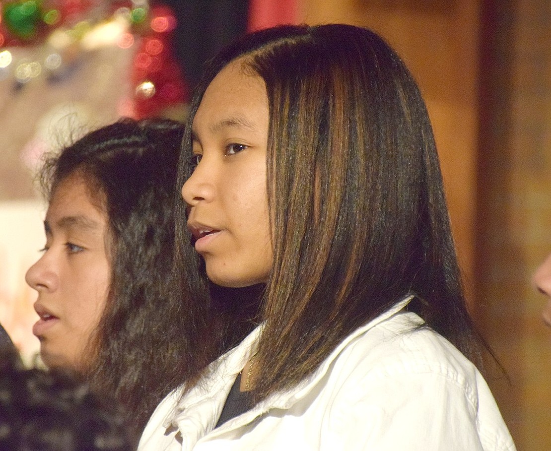 After it’s revealed an angel told the pregnant Mary that she’s sure to have a baby boy, Alexis Matos-Callados stands with other chorus members to sing “God Has a Plan.”