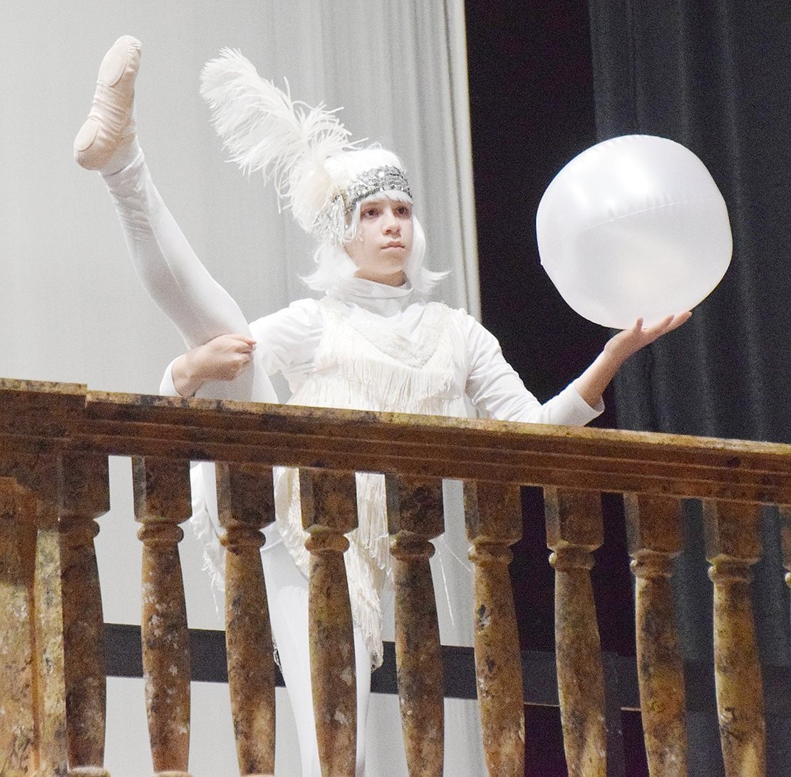 While portraying the moon, seventh-grader Grace Brunetti performs a dance routine as Uncle Fester sings about how he is in love with it during “The Moon and Me.”