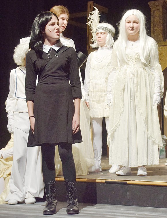 After Lucas Beineke runs off due to a bizarre dinner with the Addams family, Wednesday (played by seventh-grader Abby Meron) tells her fiancé that she is upset he left.