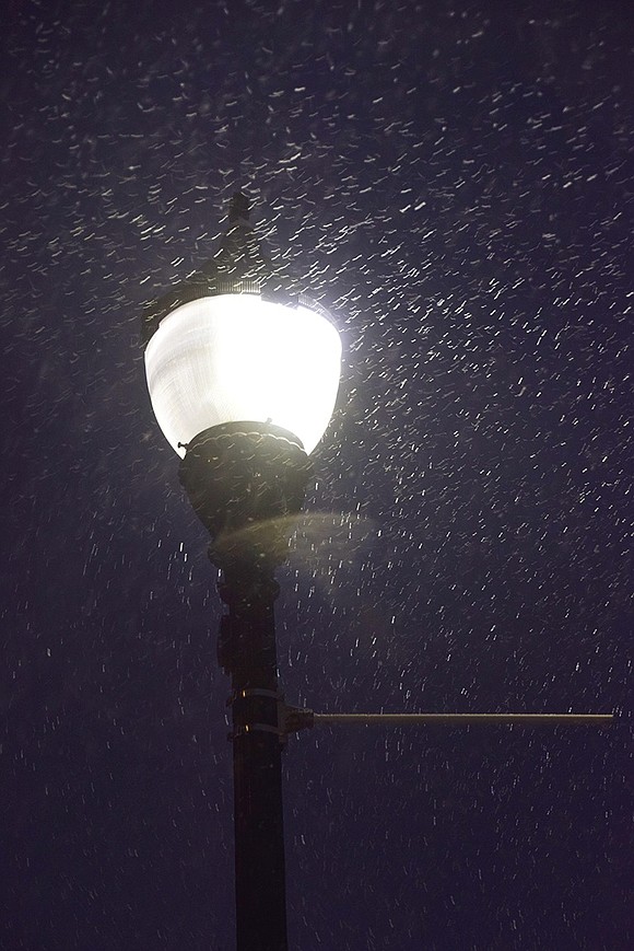 Falling snow is illuminated by a decorative streetlight on North Main Street. Jananne Abel|Westmore News 