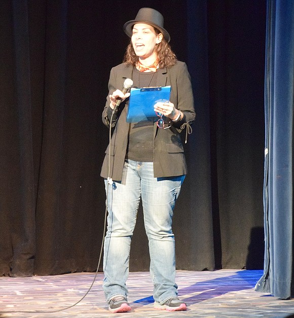 During the sold-out show, emcee and Ridge Street School Principal Tracy Taylor riles up the crowd in the Blind Brook High School auditorium before the next act comes on. 