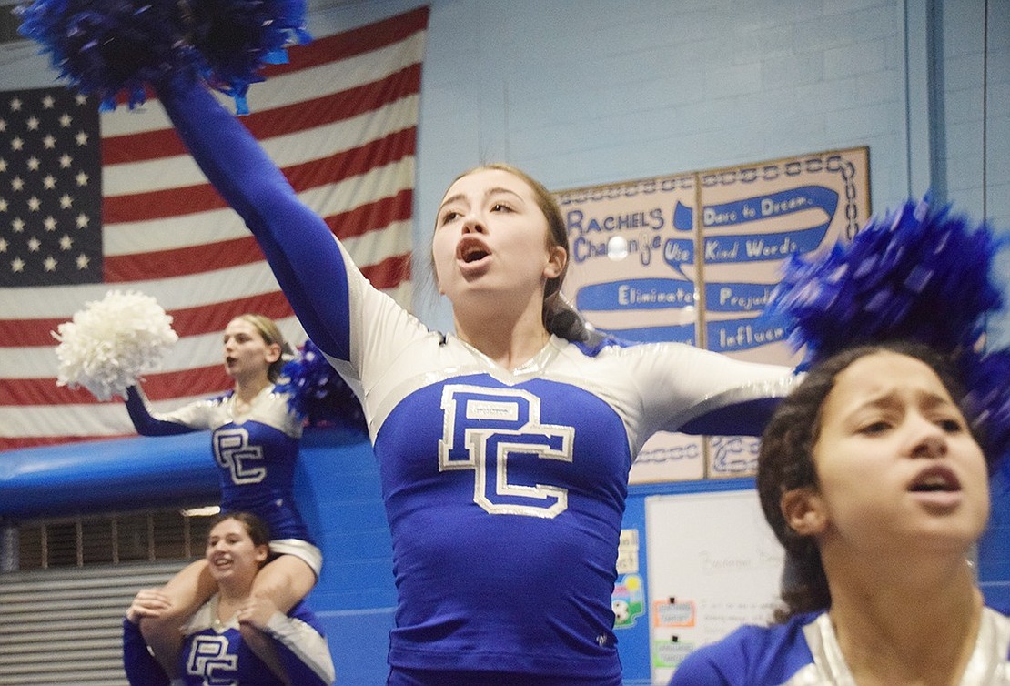 Port Chester High School senior and varsity cheerleader Sydney Sullivan yells out one of the team’s chants during a public showcase of their winter competition routine on Tuesday, Feb. 4. The team will be traveling to the Universal Cheerleaders Association Nationals in Orlando, Fla. to perform on Feb. 6.