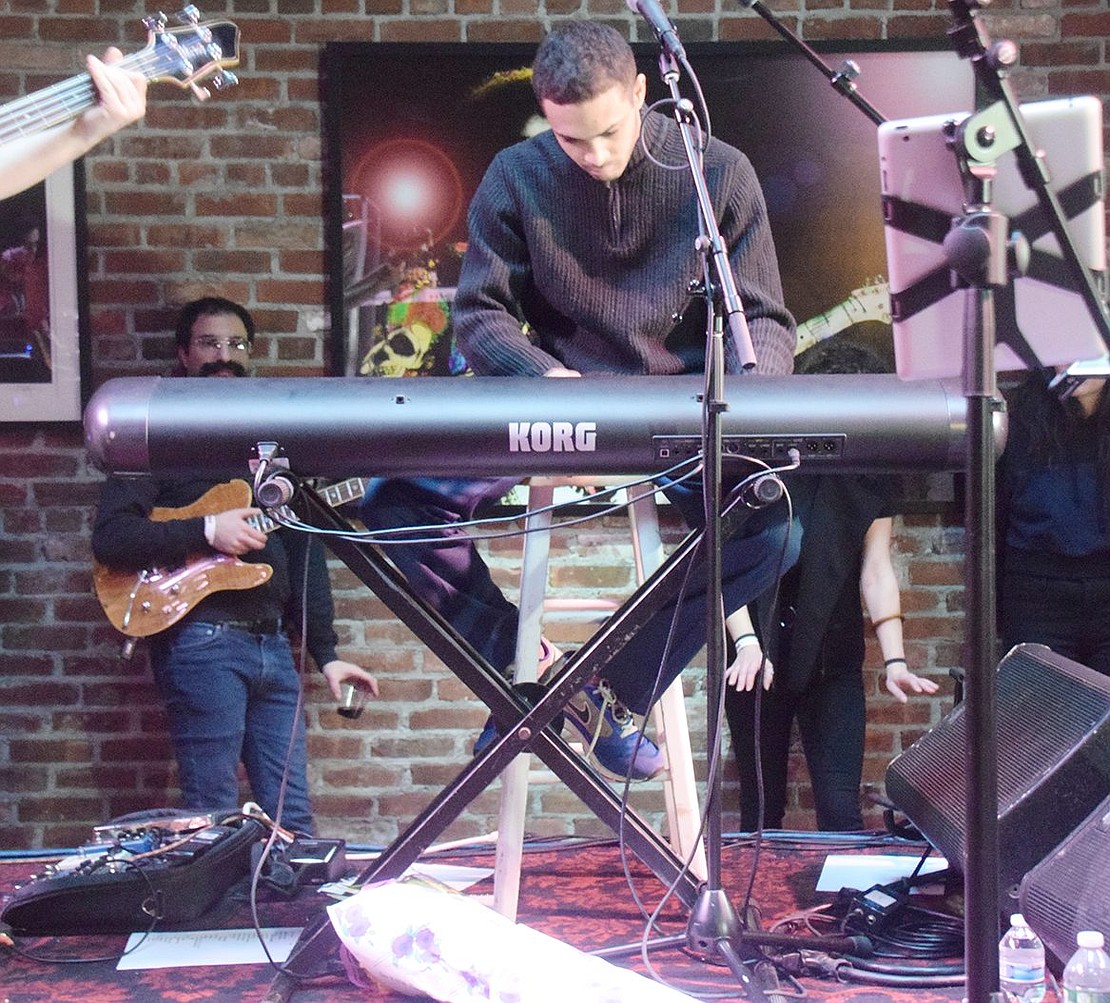 Musician and special guest Jewels Harrison remain focused as he quickly taps away “Root Beer Rag” by Billy Joel on his Korg keyboard.