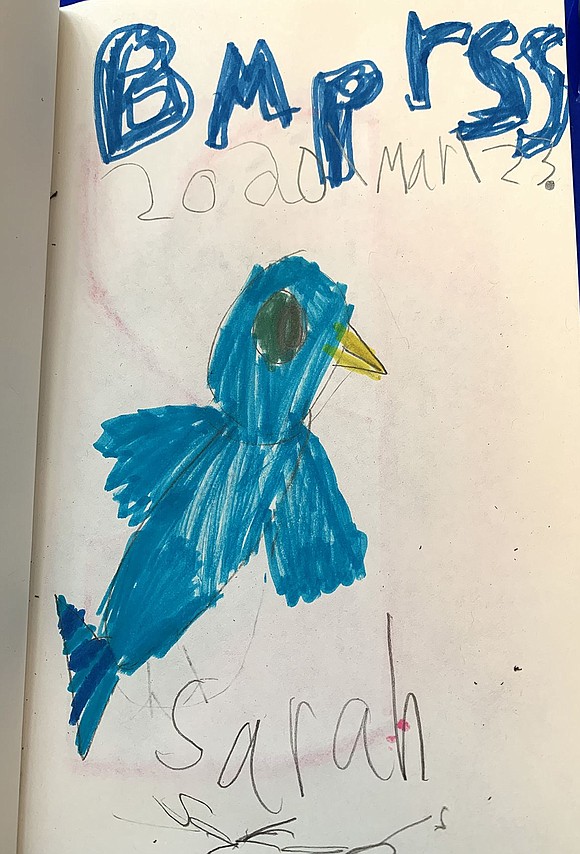 Ridge Street School kindergartner Sarah Craighead proudly signed her name after drawing a bluebird masterpiece. Courtesy of Danielle Craighead 