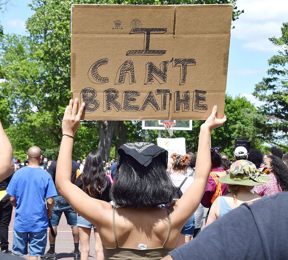 Quoting the last words George Floyd spoke, White Plains 16-year-old Zaida Polanco raises a sign reading “I can’t breathe” above all heads at Columbus Park.