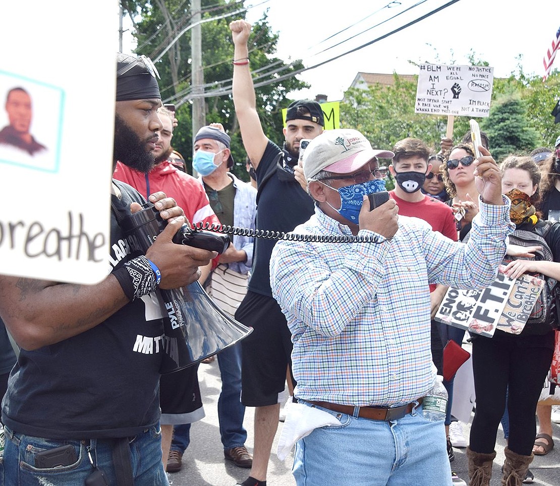 Port Chester activist Luis Yumbla rallies the Hispanic crowd with a Spanish speech about the Black Lives Matter movement.