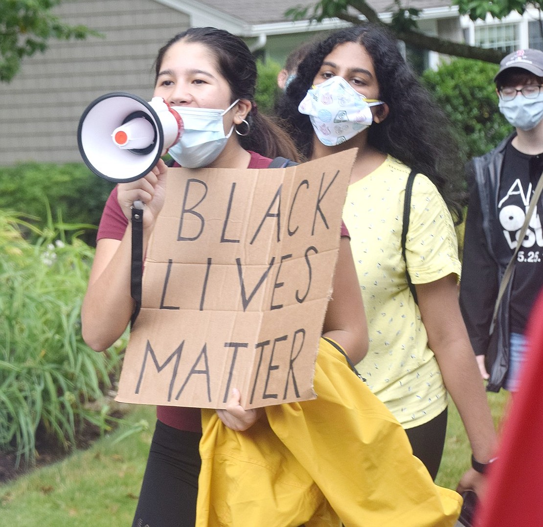 Blind Brook High School rising sophomore Sarah Perlman and other youth take to the streets of Rye Brook on Tuesday, June 30, to protest police brutality and systemic oppression. The march, which was organized by Blind Brook High School students, hosted about 50 people.  