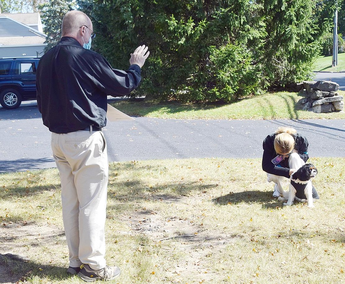 Tails were wagging at St. Paul’s Lutheran Church at 761 King St. on Sunday, Oct. 4, during the annual Blessing of the Animals ceremony in observance of the feast day of St. Francis of Assisi. Greenwich, Conn., resident Jan Brennan, a parish nurse, bows her head as Pastor Jim O’Hanlon gives her dog Gwendolyn a blessing.